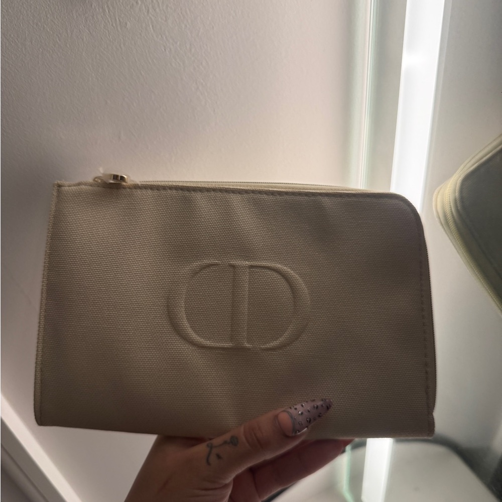 CD Embossed Cream Canvas Zip Pouch